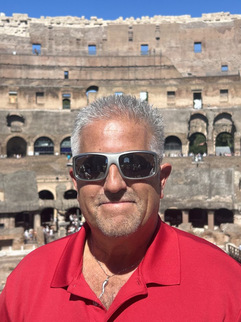 Question Maahk Trivia's Mark Marino at the Colosseum.